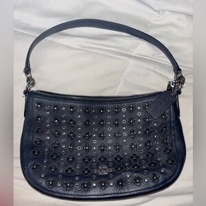Coach Chelsea crossbody purse in navy blue.
